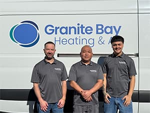 Granite Bay Heating & Air HVAC Team – Granite Bay, CA Granite Bay Heating & Air technicians posing in front of company service van in Granite Bay, CA