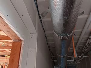 New HVAC ductwork installation in attic during air conditioning system upgrade AC replacement of older outdoor unit – Granite Bay HVAC service