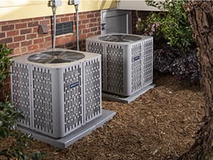 Residential air conditioning systems in Granite Bay, CA Two residential outdoor air conditioning units installed in a Granite Bay backyard