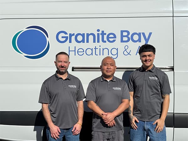 Granite Bay Heating & Air HVAC Team – Granite Bay, CA Granite Bay Heating & Air technicians posing in front of company service van in Granite Bay, CA
